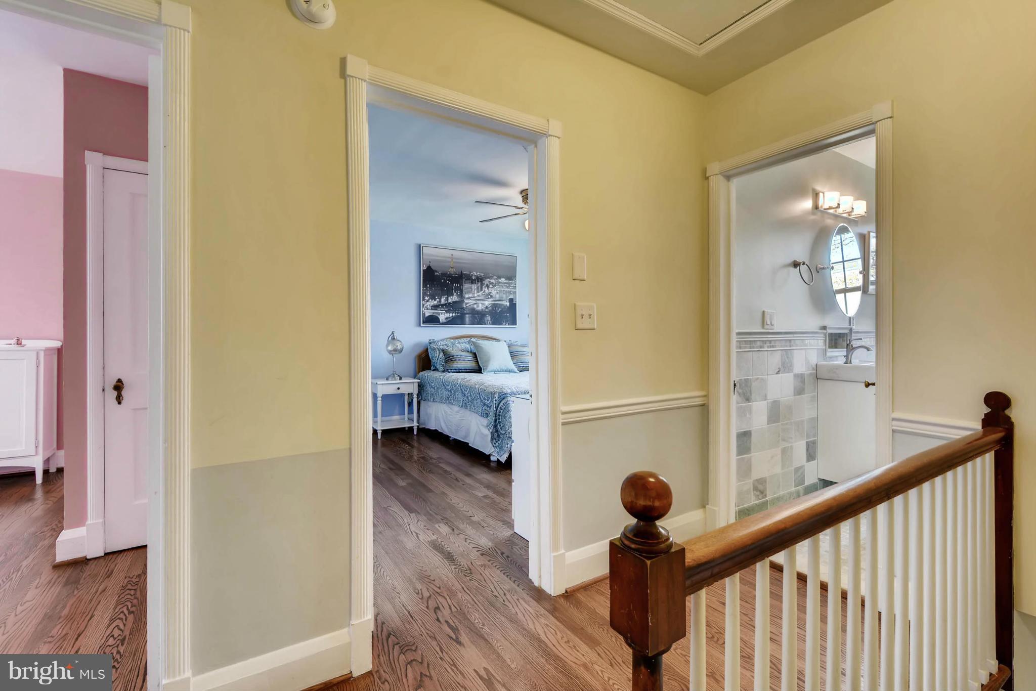 307 Dumbarton Road Baltimore, MD 21212 - Photo 22 of 29 a view of a hallway and a livingroom with furniture