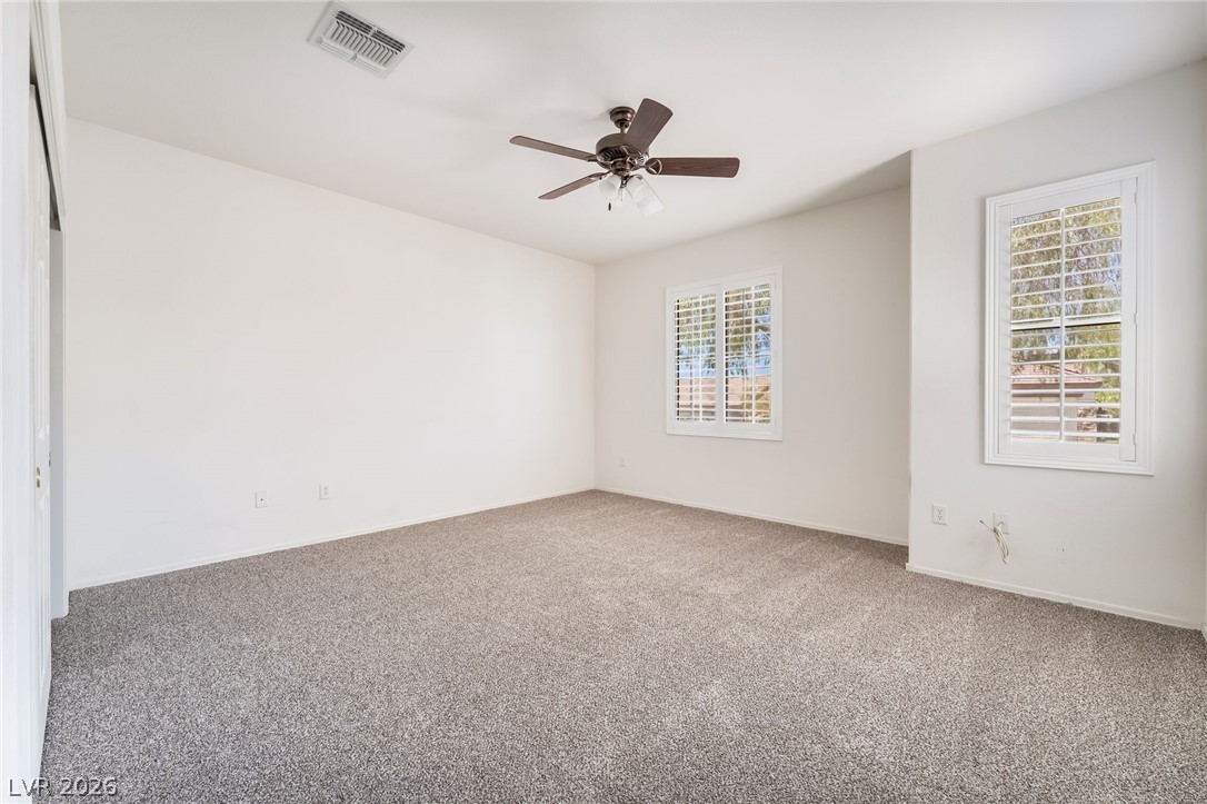 3033 Hartsville Road Henderson, NV 89052 - Photo 32 of 41 A quiet retreat with fresh carpeting and ample light, perfect for personalization.