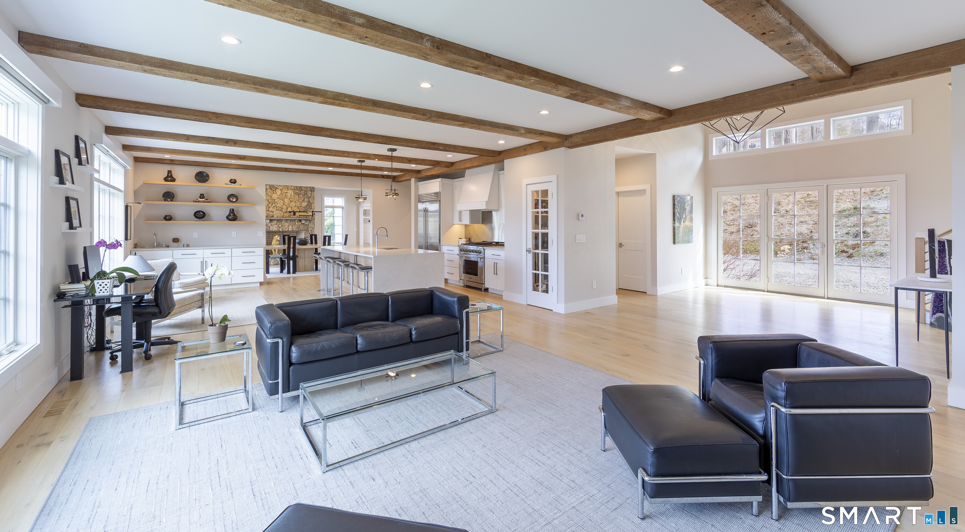 5 Upland Pastures Road Sherman, CT 06784 - Photo 11 of 40 Open concept design between the great room, chef's kitchen and breakfast area.