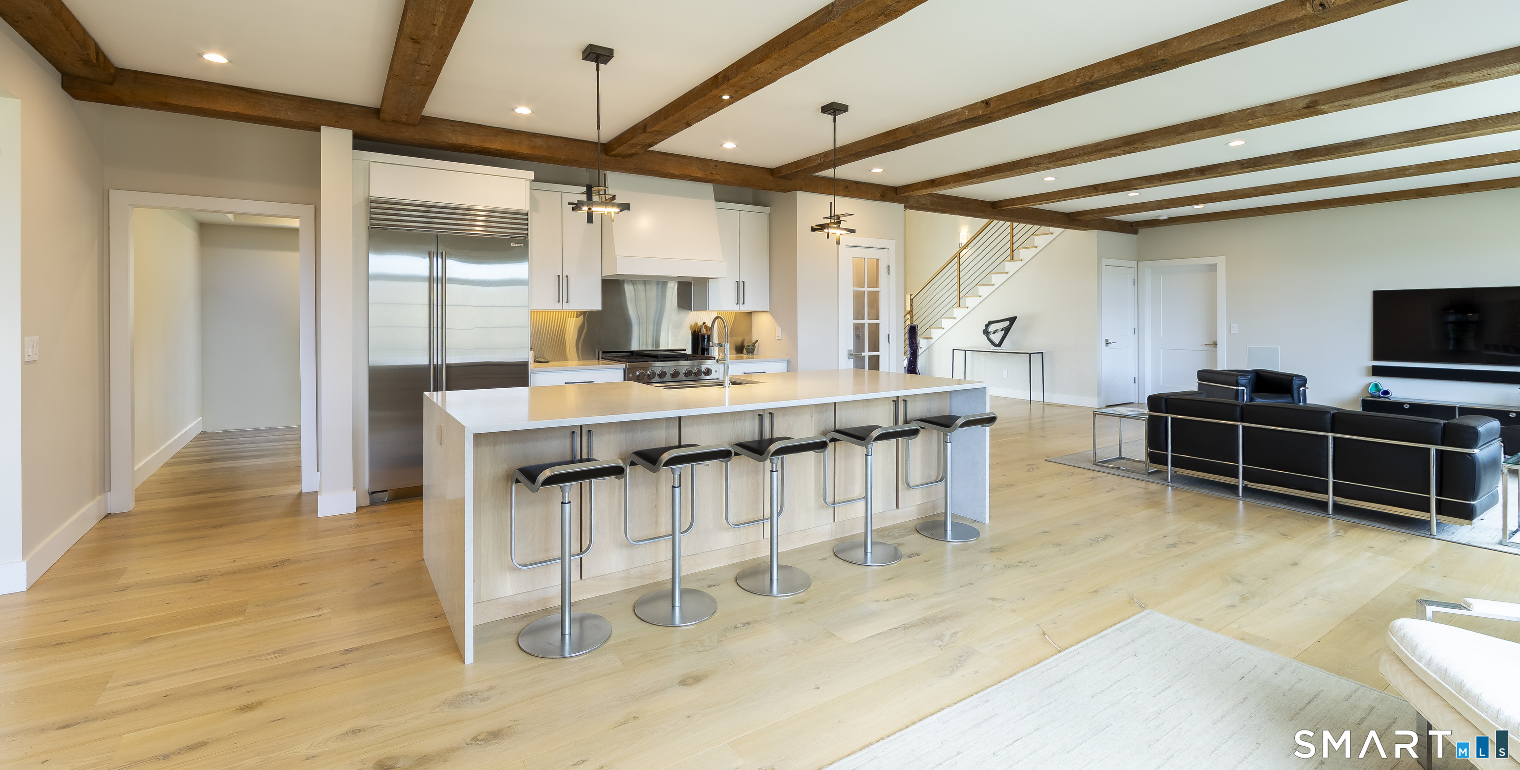 5 Upland Pastures Road Sherman, CT 06784 - Photo 14 of 40 Island seating for five with cabinetry on both sides,