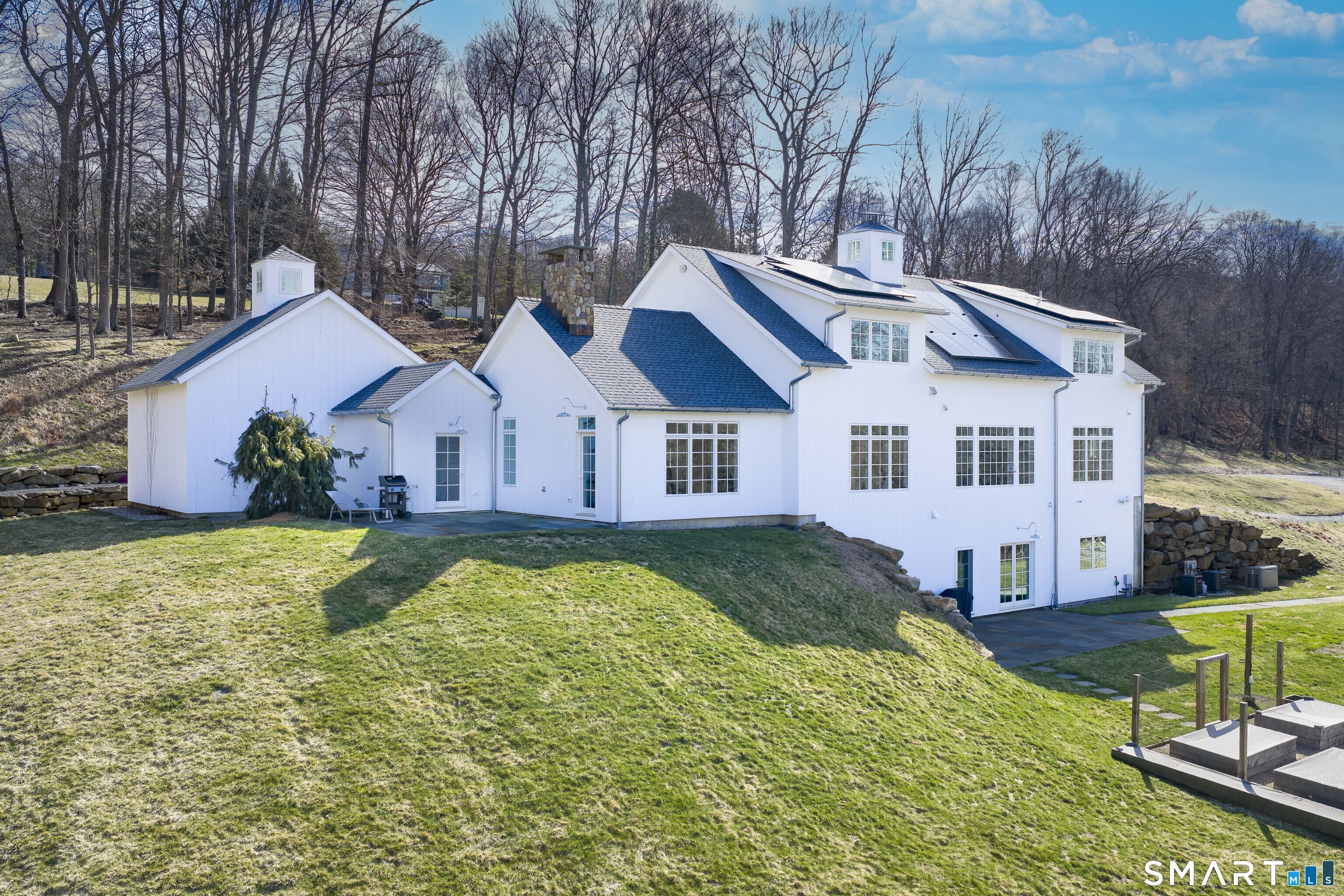 5 Upland Pastures Road Sherman, CT 06784 - Photo 5 of 40 Built in 2021, the residence still feels brand new, with 5 bedrooms, 4 full baths, and 1 half bath over 3 levels, including a legal accessory apartment.