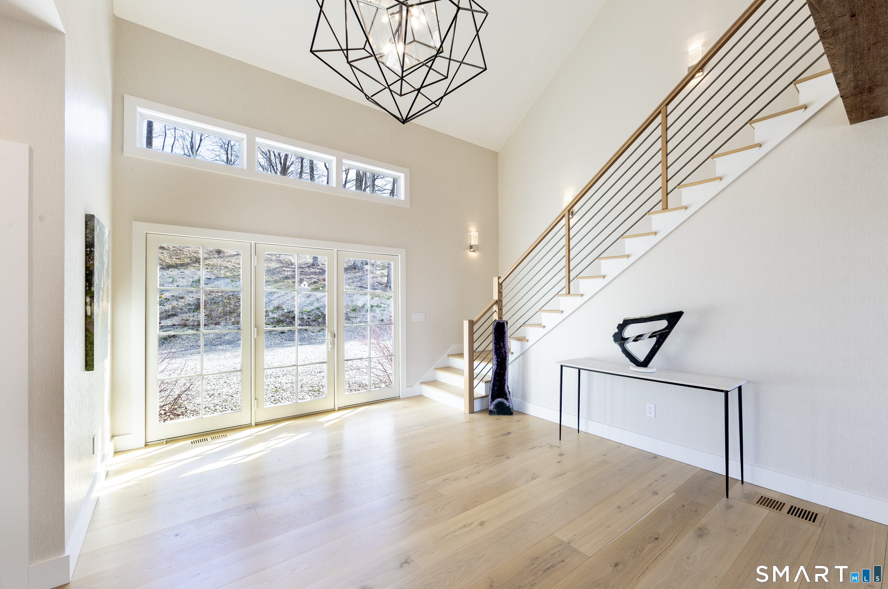 5 Upland Pastures Road Sherman, CT 06784 - Photo 8 of 40 A dramatic two-story foyer sets the tone.