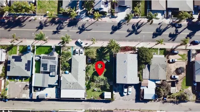 an aerial view of multi story residential apartment building with outdoor space