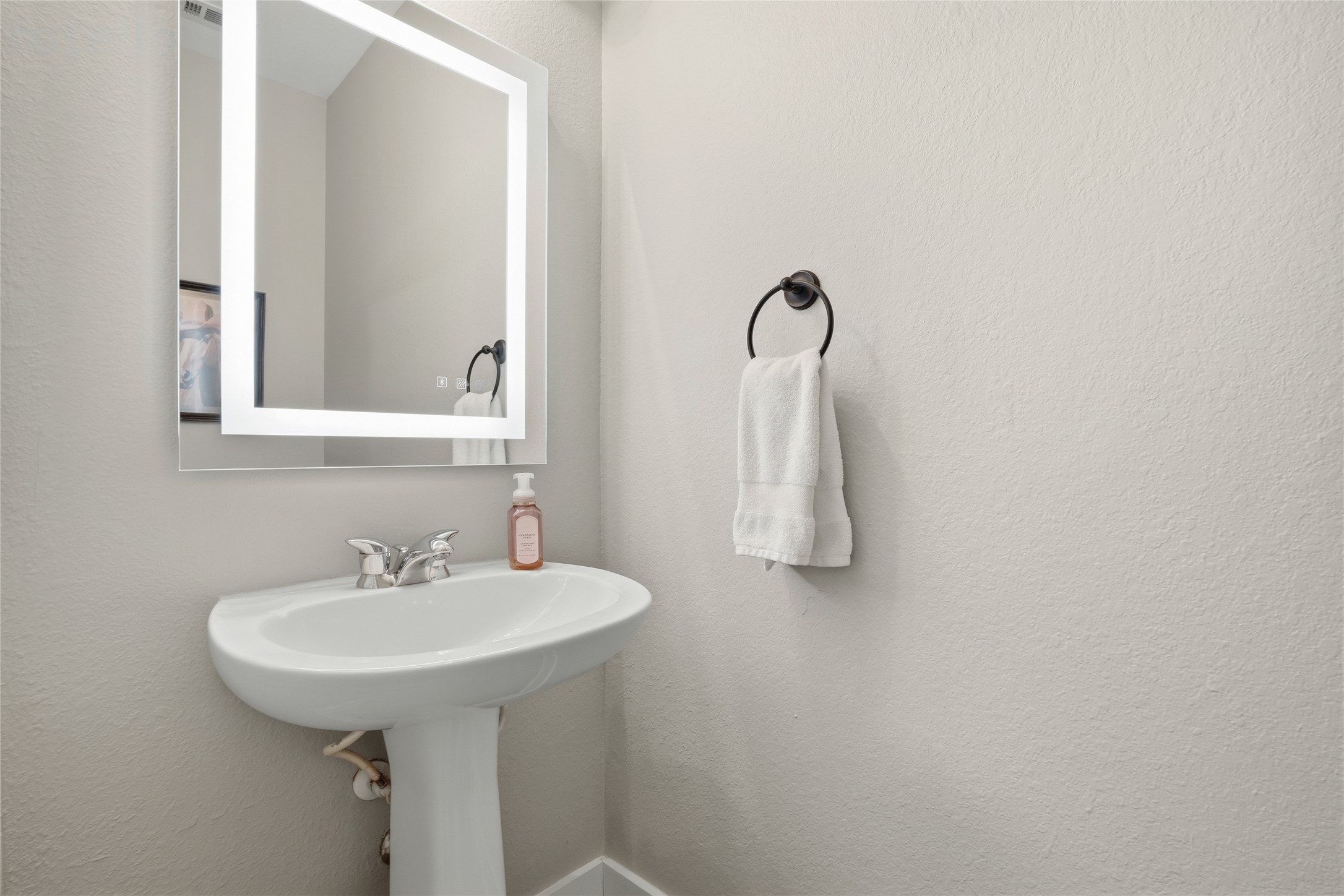 13922 Jubilee Way Helotes, TX 78023 - Photo 19 of 27 1/2 bathroom downstairs