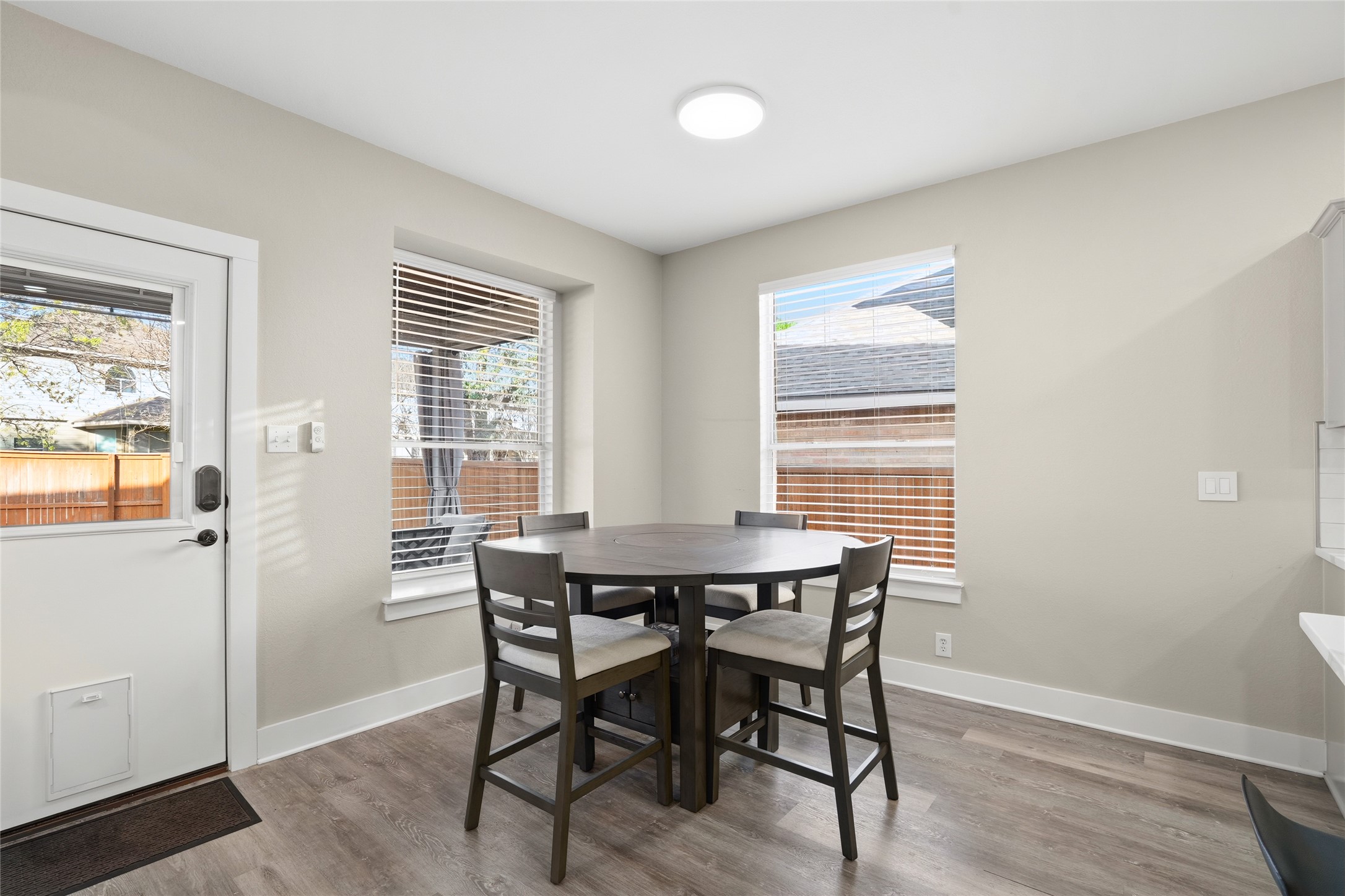 13922 Jubilee Way Helotes, TX 78023 - Photo 6 of 27 Dining area with wood finished floors and plenty of natural light