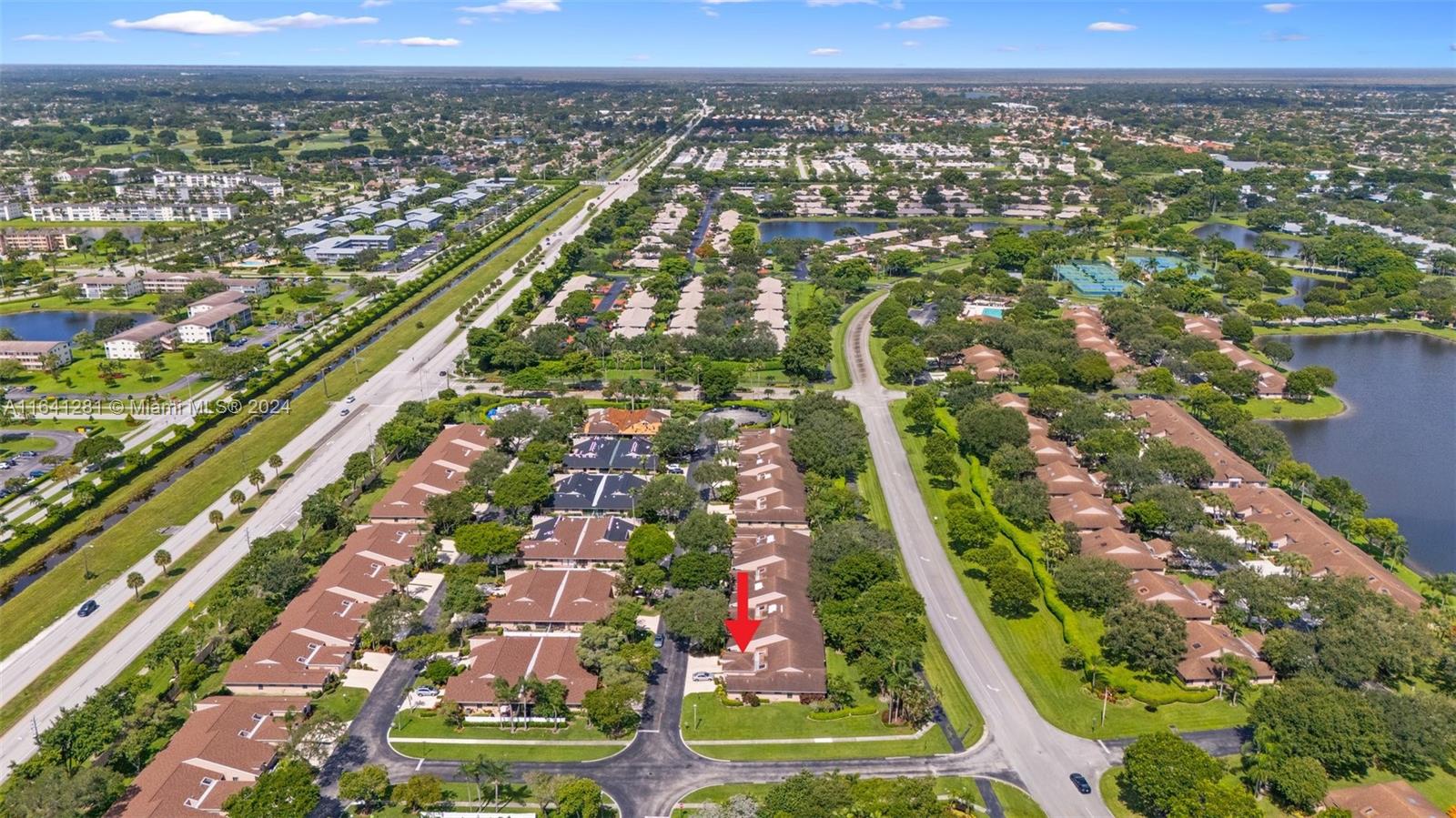 8269 Springtree Road, Unit G Boca Raton, FL 33496 - Photo 29 of 33 an aerial view of residential houses with outdoor space