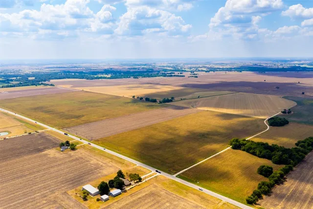 an aerial view of beach and city