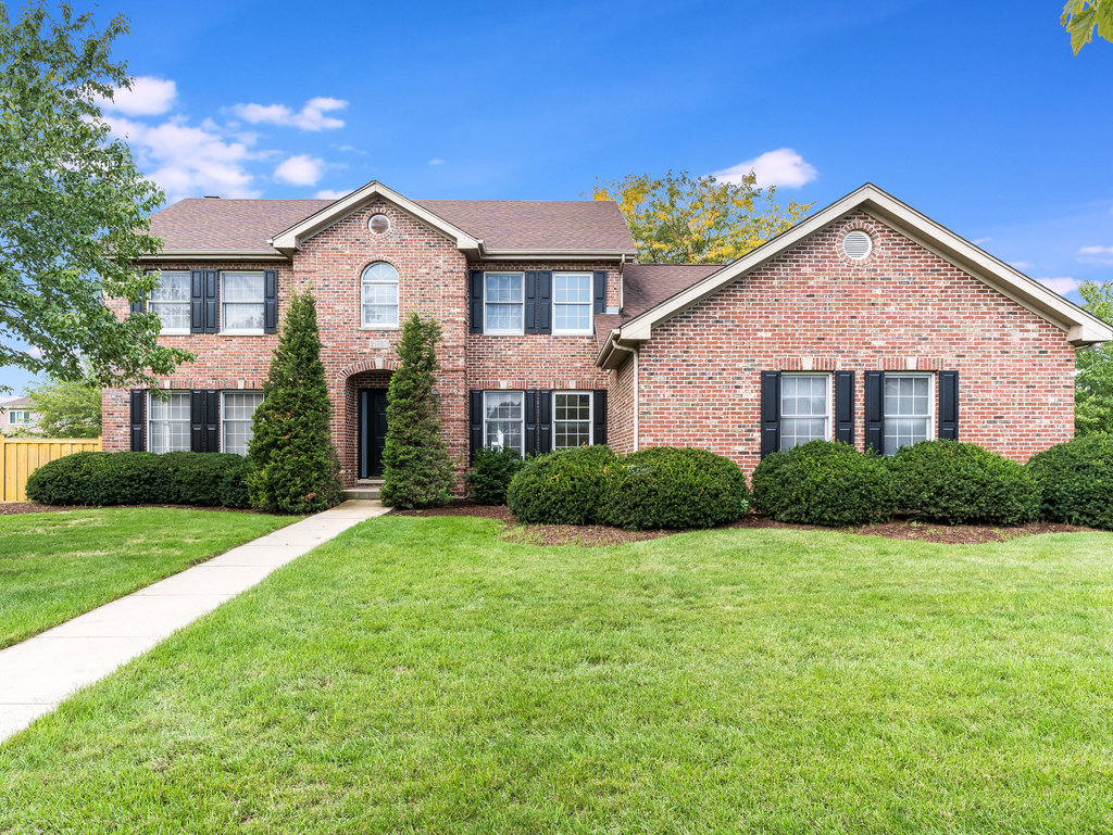 21322 Georgetown Road Frankfort, IL 60423 - Photo 1 of 28 a front view of a house and yard