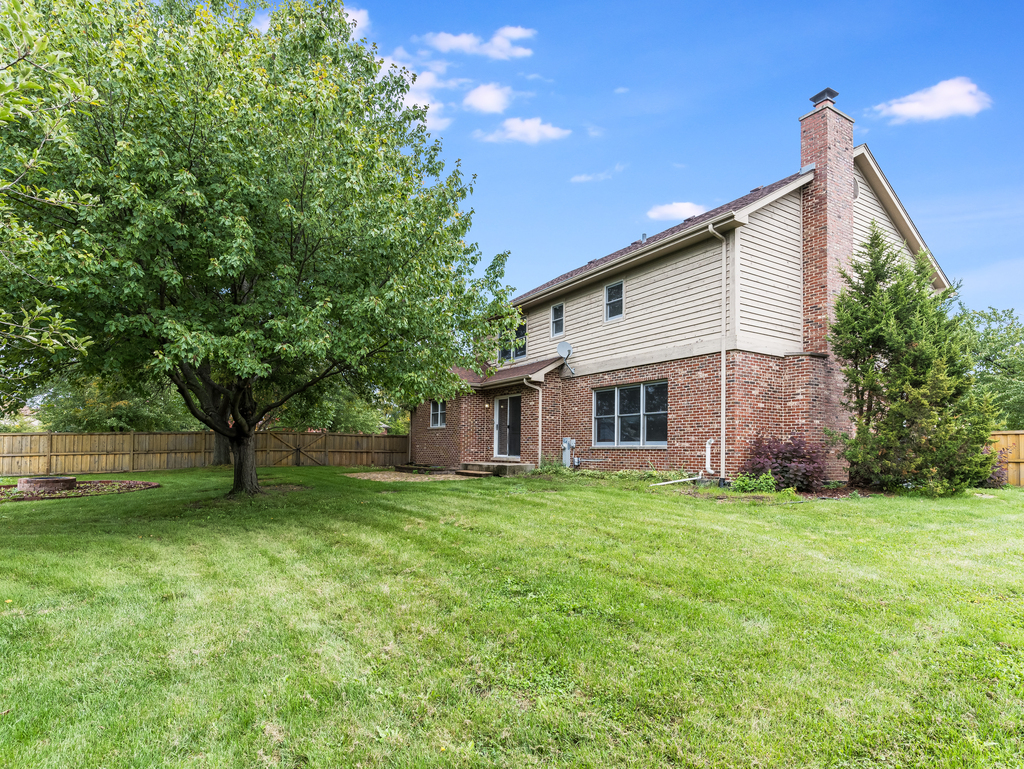 21322 Georgetown Road Frankfort, IL 60423 - Photo 22 of 28 a view of a house with a backyard