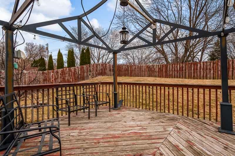 5094 Grand Cape Road Rockford, IL 61109 - Photo 23 of 30 a view of a balcony with wooden floor