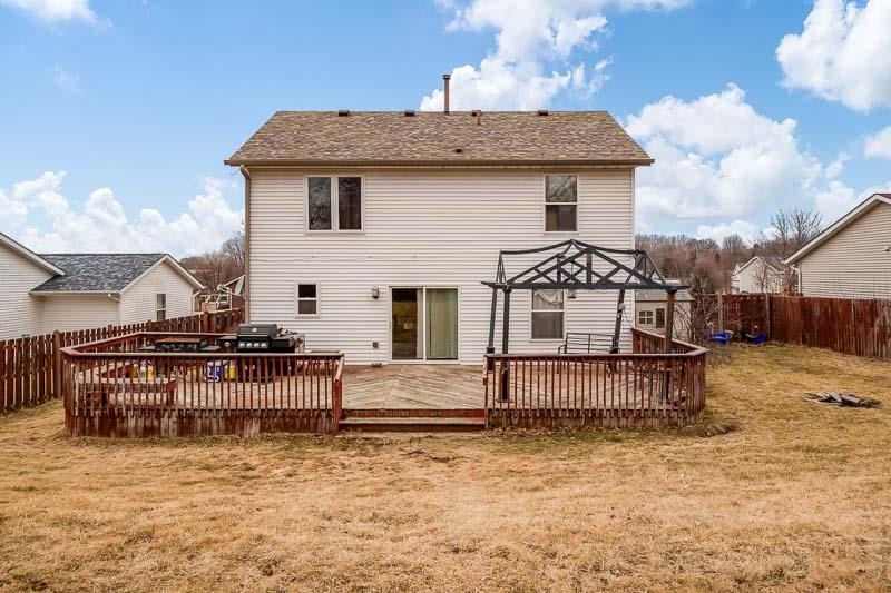 5094 Grand Cape Road Rockford, IL 61109 - Photo 26 of 30 a view of a house with wooden deck