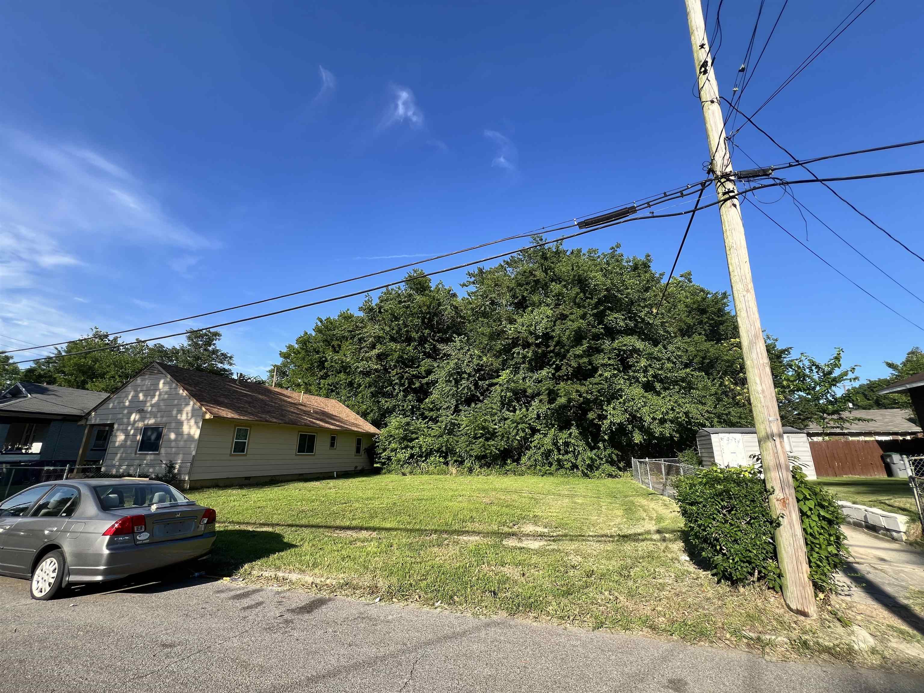 996 Rozelle Street Memphis, TN 38114 - Photo 4 of 4 a car parked in front of a house