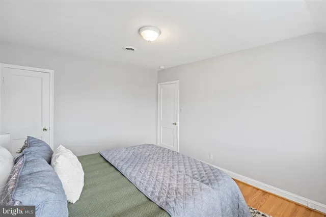 a bedroom with a bed