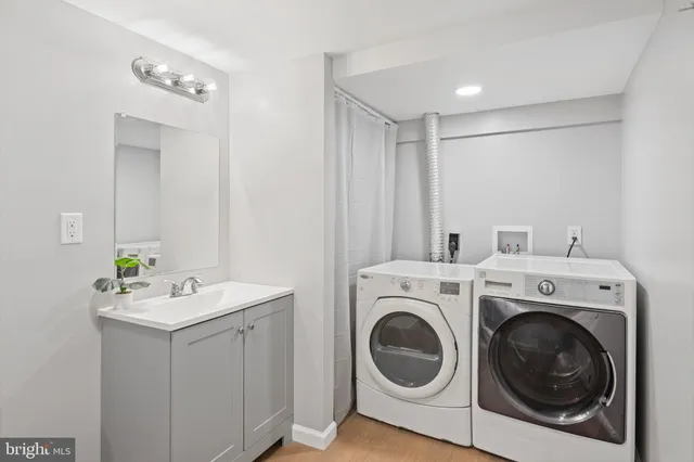 a utility room with dryer and washer