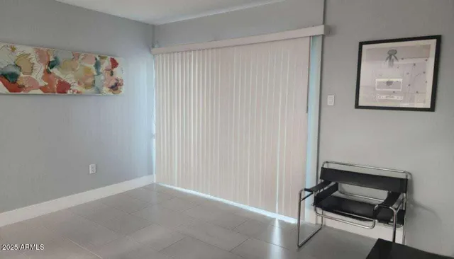 a view of a hallway with a workspace