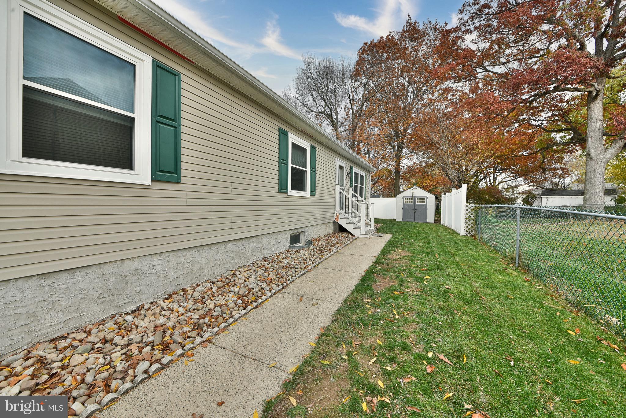601 Fourth Avenue Croydon, PA 19021 - Photo 8 of 44 Side walk to the entrance of the home