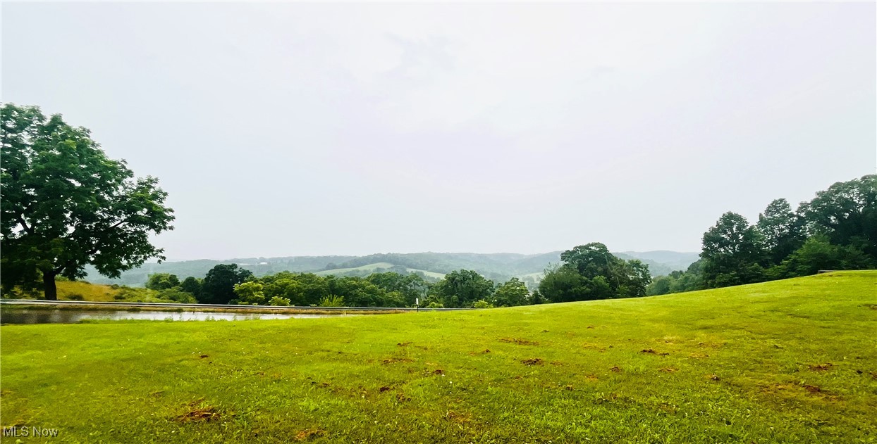 91070 Kilgore Ridge Road Scio, OH 43988 - Photo 38 of 40 View of green lawn with a water and mountain view and a view of countryside