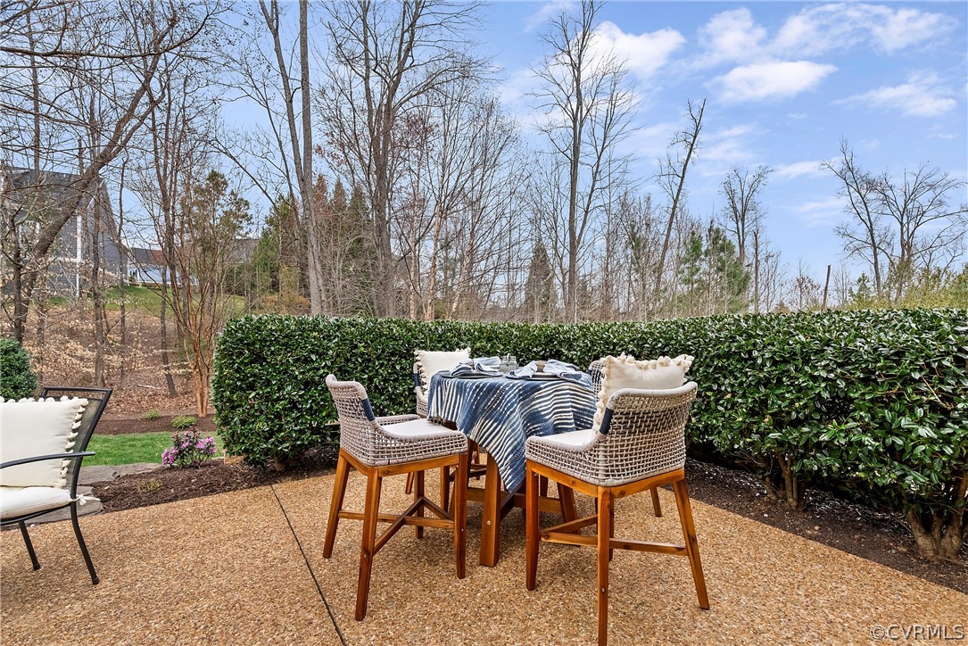 3618 Edenfield Road Midlothian, VA 23113 - Photo 48 of 50 a view of chairs and table in backyard