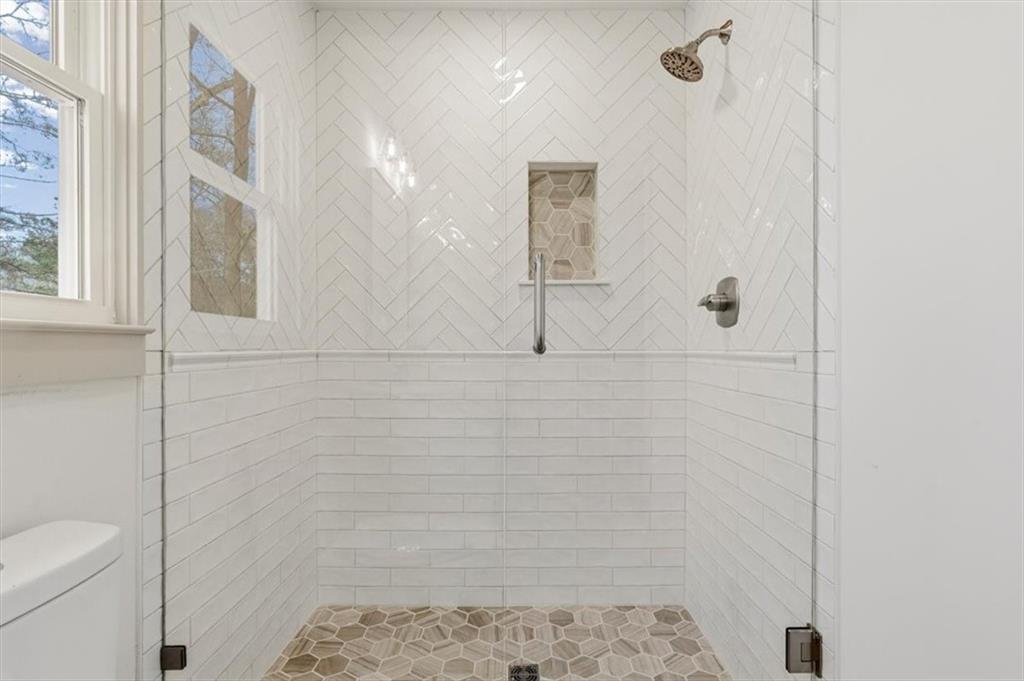 49 Apache Trail Cartersville, GA 30120 - Photo 39 of 52 a bathroom with a shower