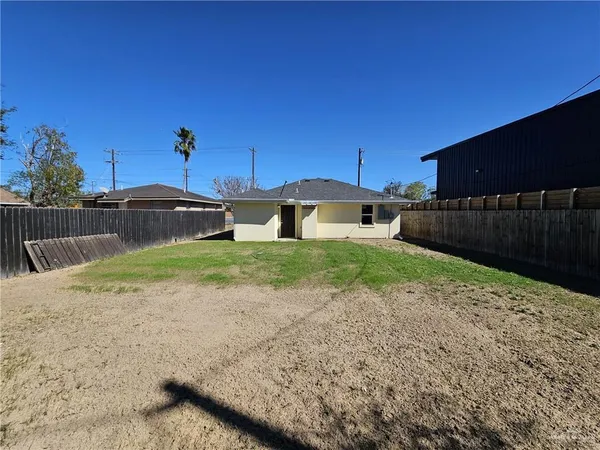 a view of a backyard with a tub