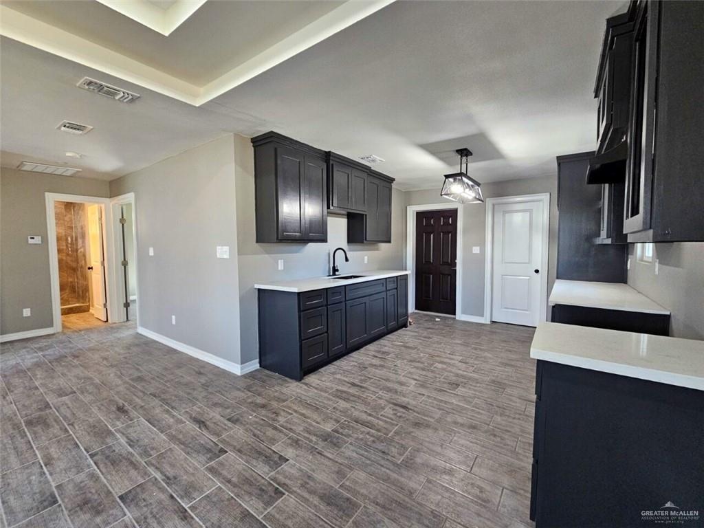 305 South Raul Longoria Road Edinburg, TX 78542 - Photo 6 of 18 a large bathroom with a sink a large mirror and shower