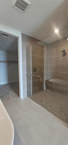a view of a refrigerator in a kitchen