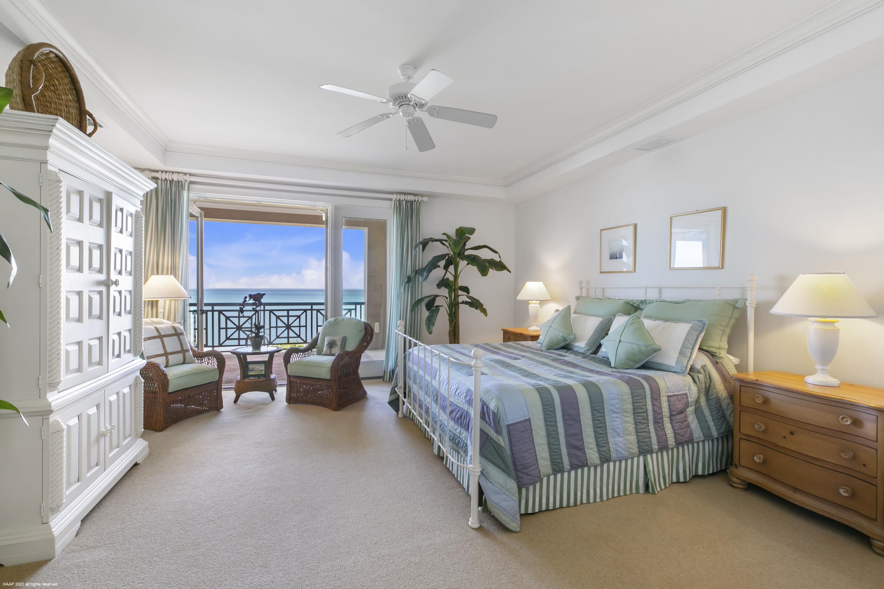 60 Beachside Drive, Unit 201 Orchid, FL 32963 - Photo 11 of 23 a bed room with a bed and a couch