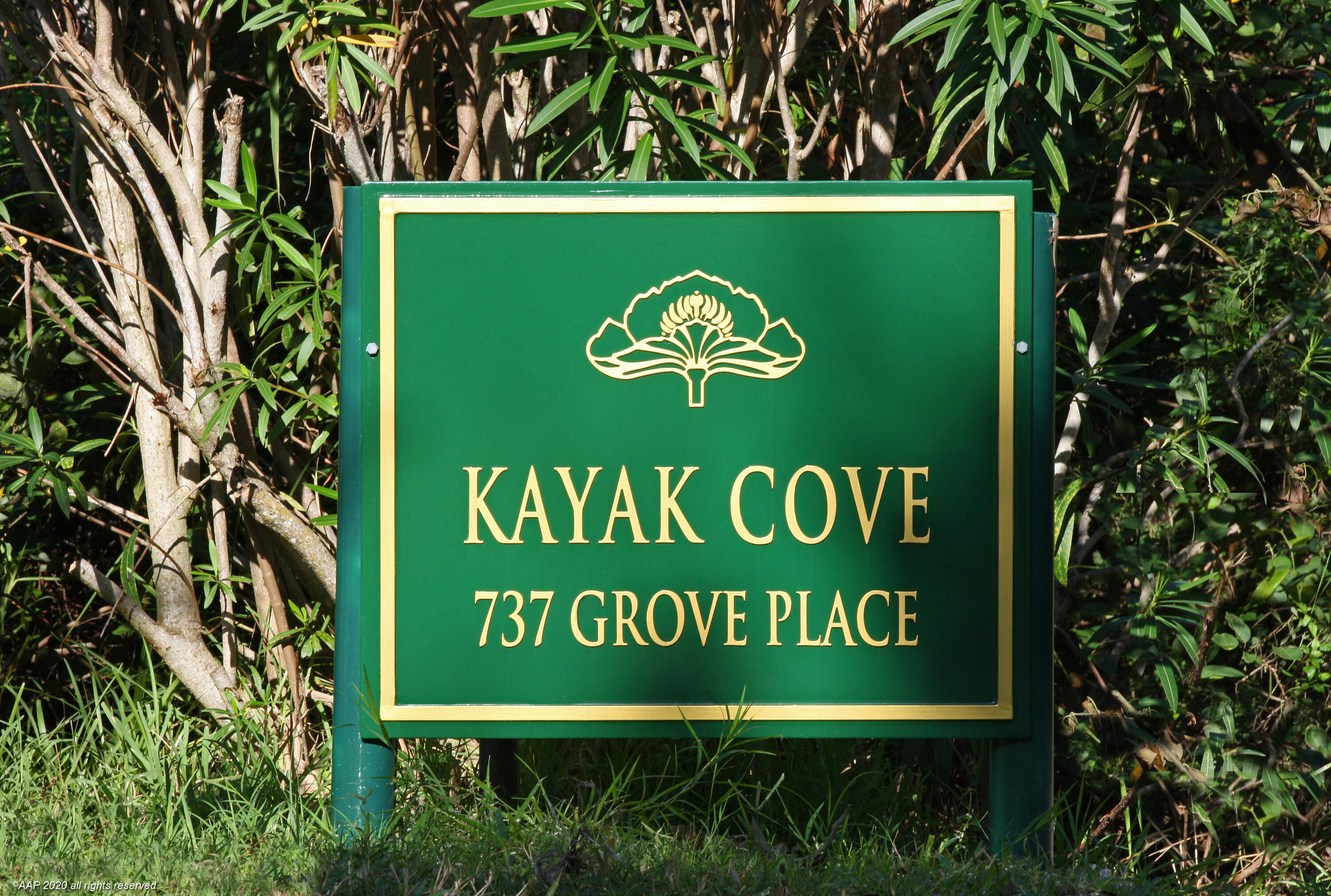 60 Beachside Drive, Unit 201 Orchid, FL 32963 - Photo 19 of 23 a sign that is sitting on a brick wall