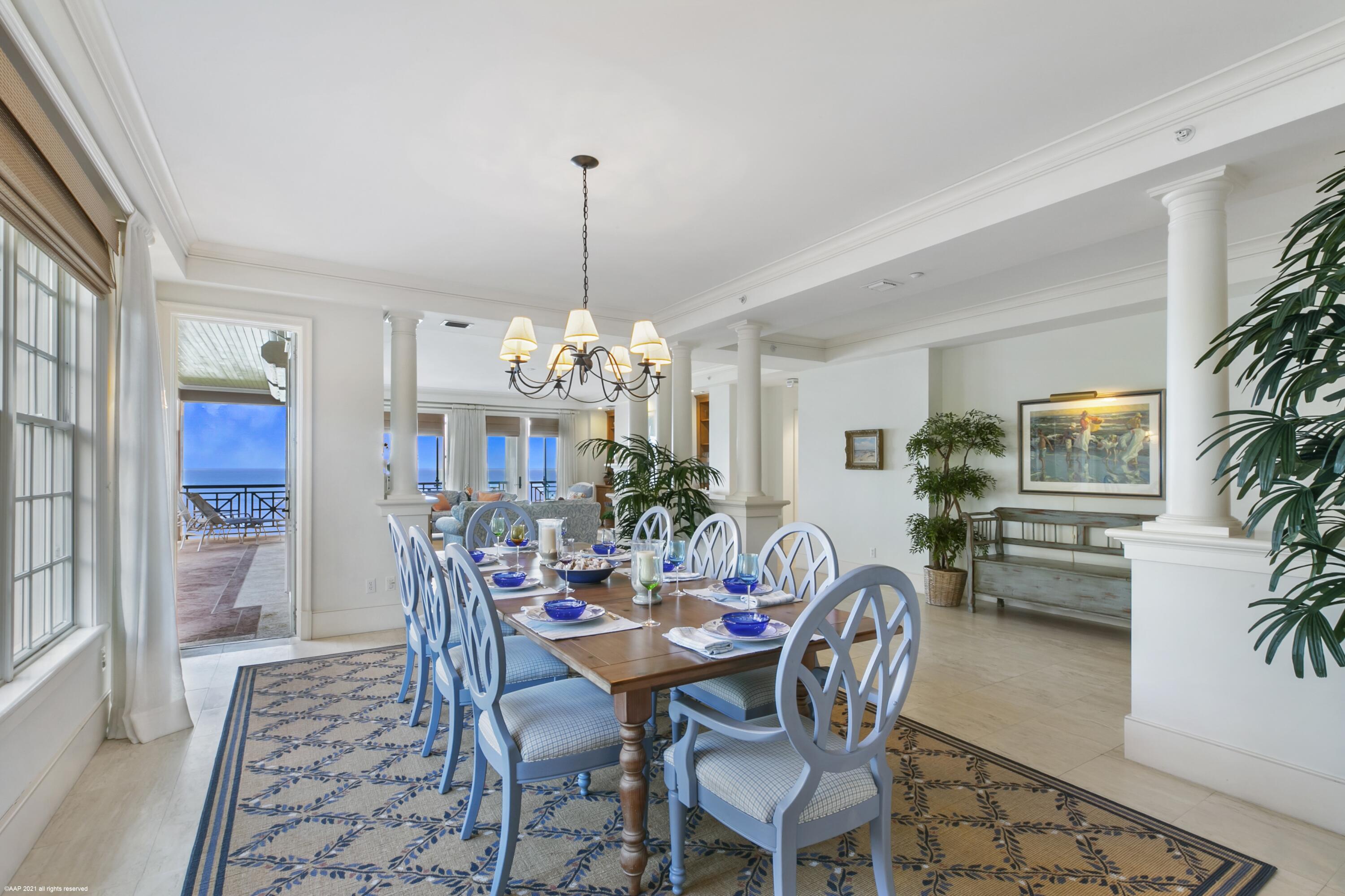 60 Beachside Drive, Unit 201 Orchid, FL 32963 - Photo 6 of 23 a view of a dining room with furniture and chandelier