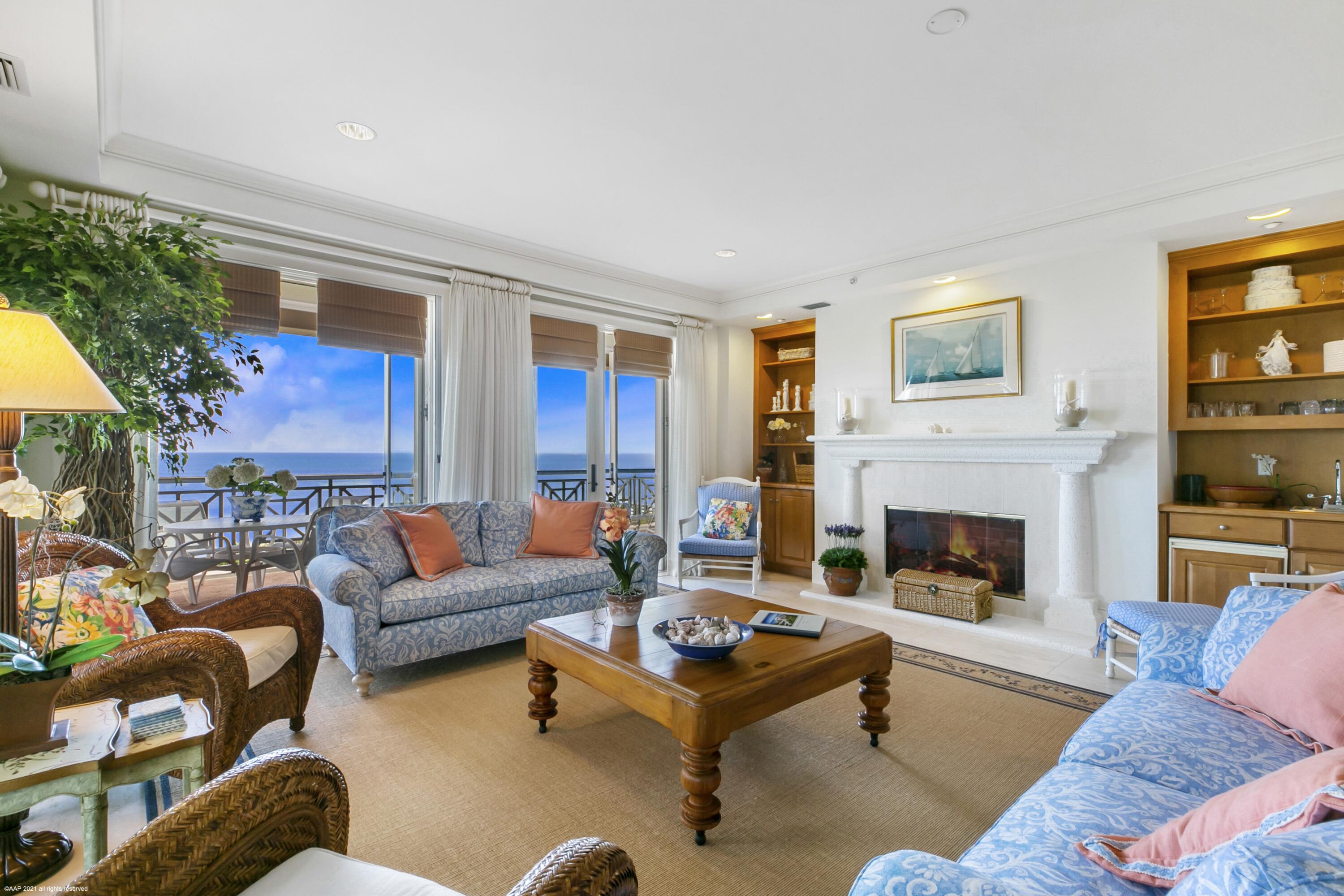 60 Beachside Drive, Unit 201 Orchid, FL 32963 - Photo 8 of 23 a living room with furniture fireplace and a table