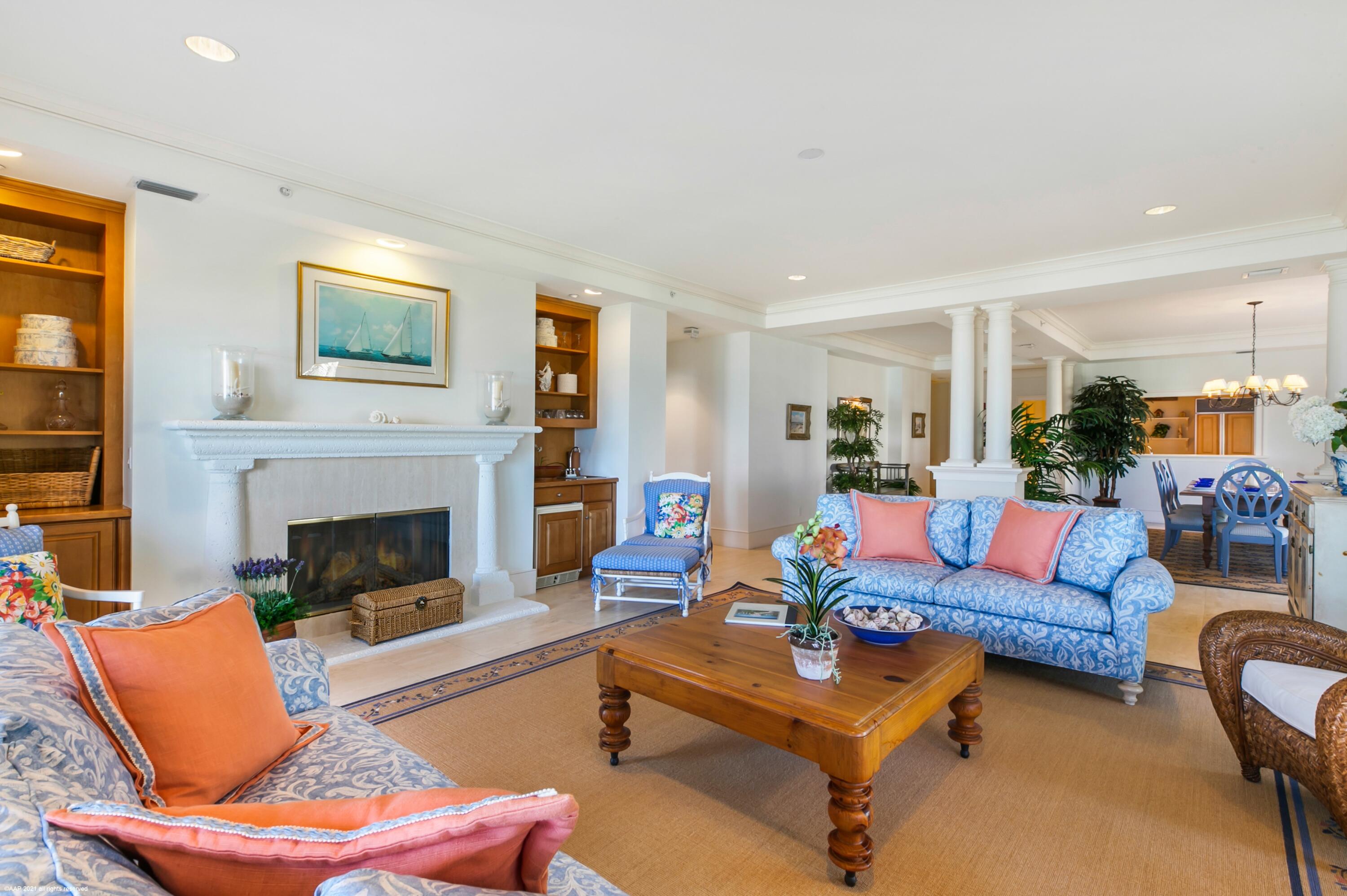 60 Beachside Drive, Unit 201 Orchid, FL 32963 - Photo 9 of 23 a living room with furniture and a fireplace