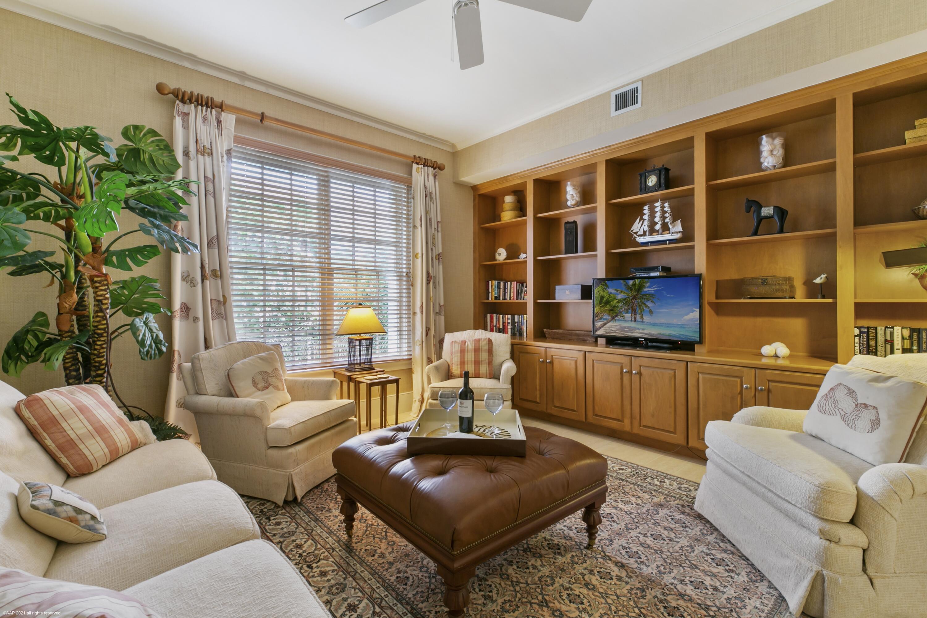 60 Beachside Drive, Unit 201 Orchid, FL 32963 - Photo 10 of 23 a living room with furniture and a large window