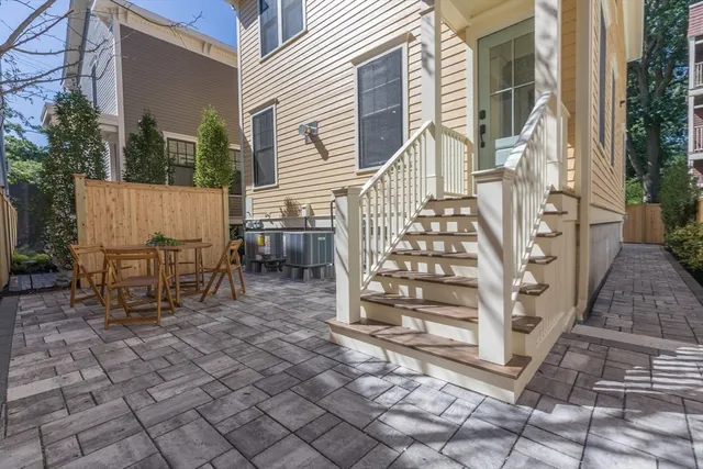 a view of a dinning tables and chairs in the patio