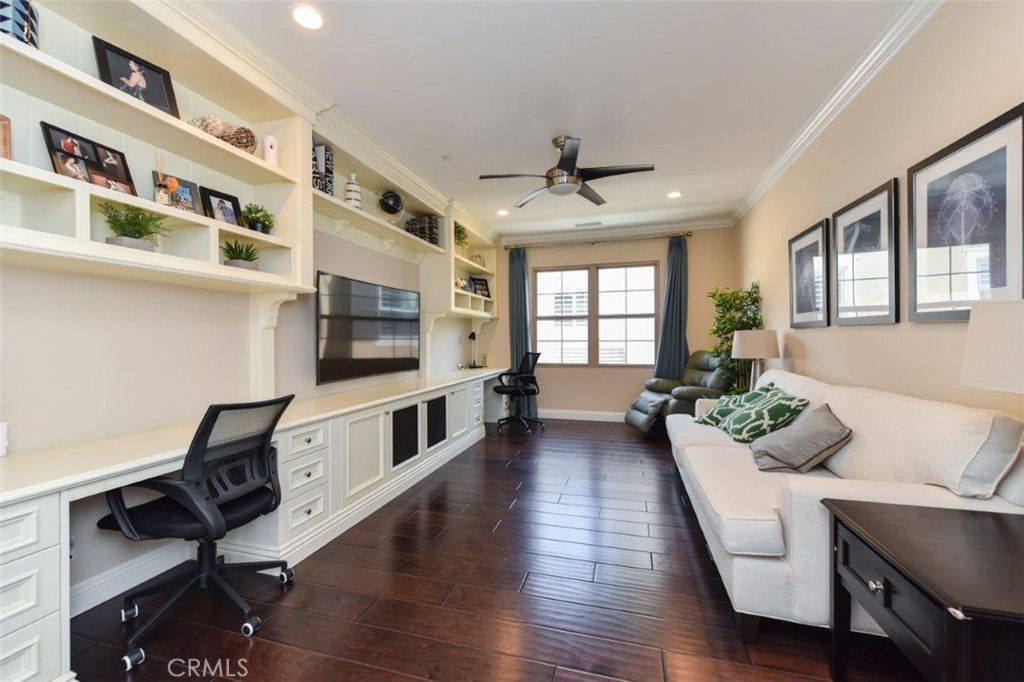 62 Rossmore Irvine, CA 92620 - Photo 13 of 43 a living room with furniture fireplace and wooden floor