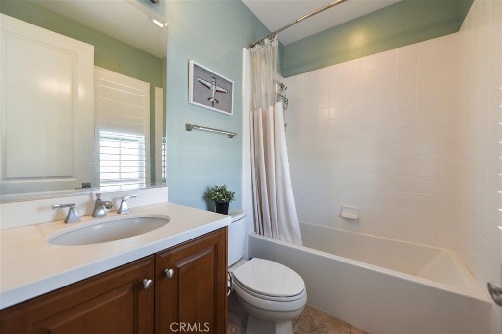 62 Rossmore Irvine, CA 92620 - Photo 24 of 43 a bathroom with a sink toilet and shower