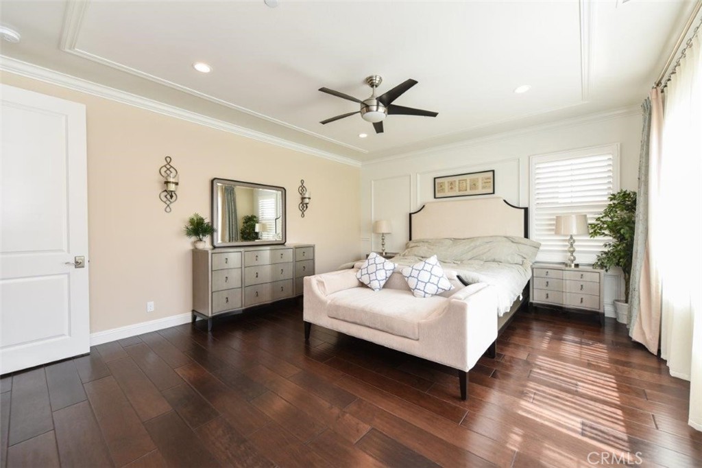 62 Rossmore Irvine, CA 92620 - Photo 27 of 43 a bedroom with a bed couch and a window