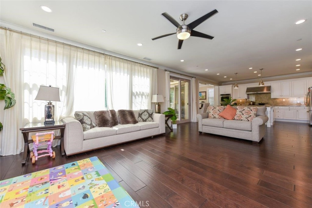 62 Rossmore Irvine, CA 92620 - Photo 8 of 43 a living room with furniture and a large window