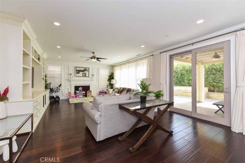 62 Rossmore Irvine, CA 92620 - Photo 10 of 43 a living room with furniture and a large window