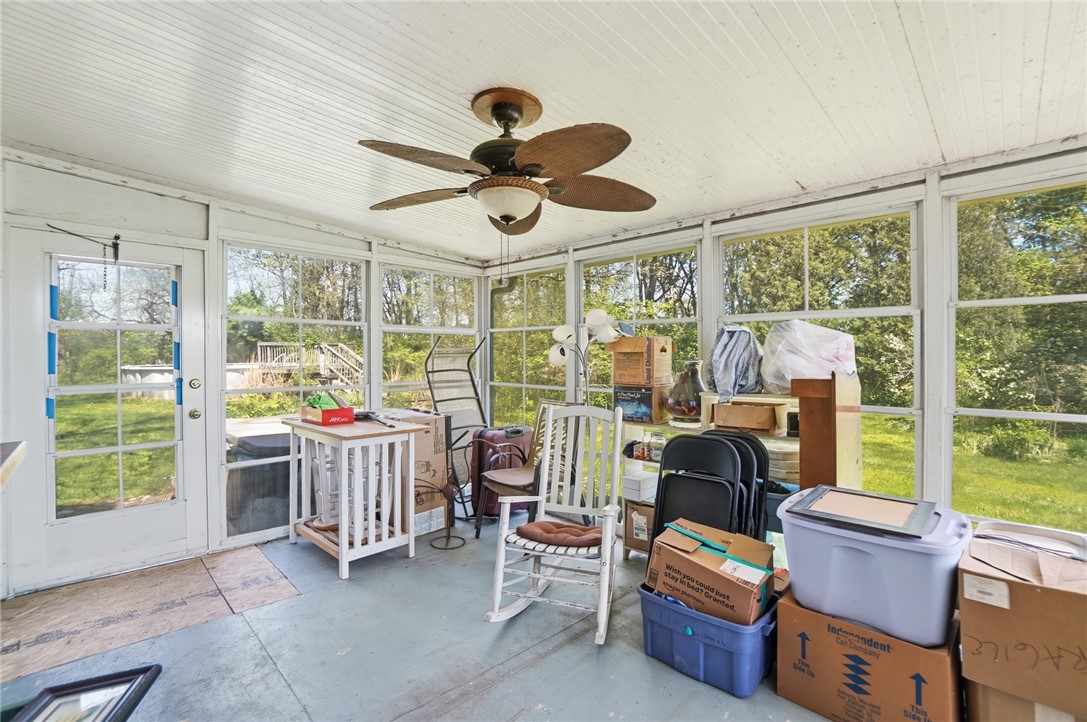 1444 Eagle City Road Springfield, OH 45504 - Photo 29 of 50 This bright sunroom offers expansive views and natural light, perfect for serene relaxation.
