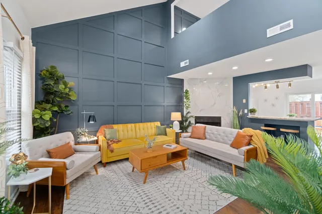 a outdoor living space with furniture and a potted plant