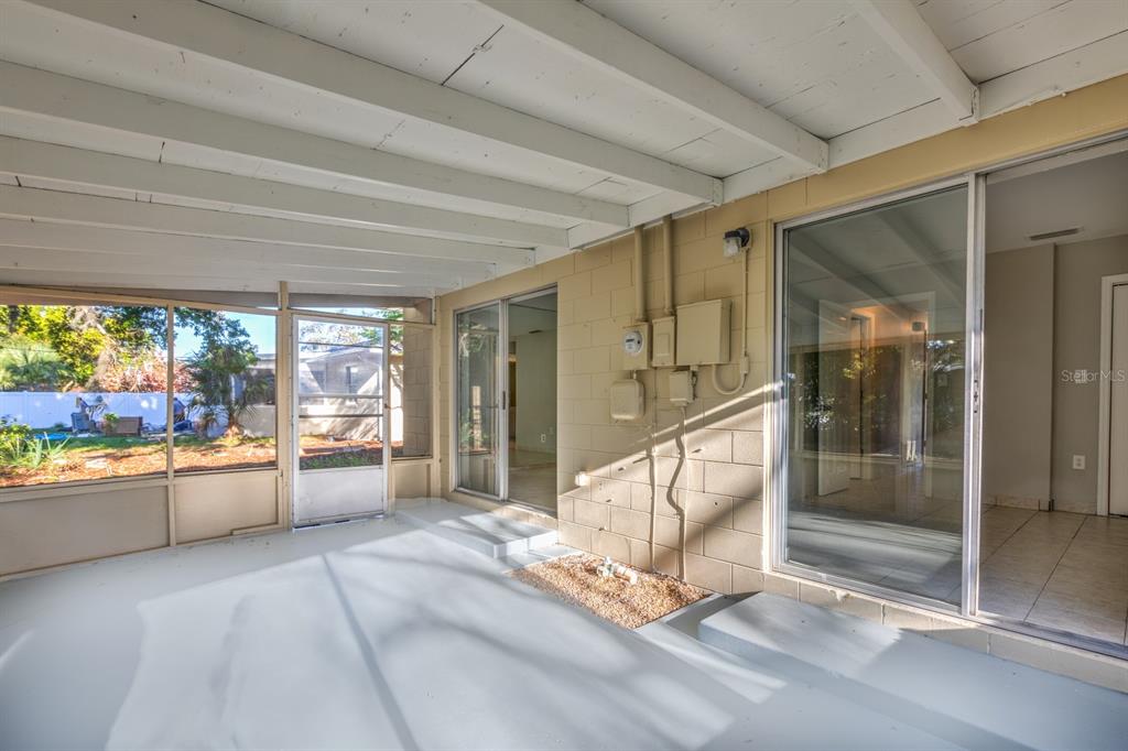 2436 Northland Road Mount Dora, FL 32757 - Photo 16 of 27 a view of an empty room and window