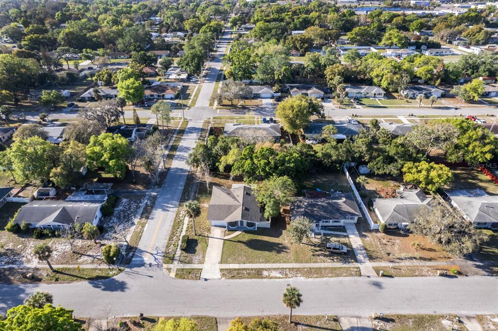 2436 Northland Road Mount Dora, FL 32757 - Photo 23 of 27 a view of multiple houses with yard