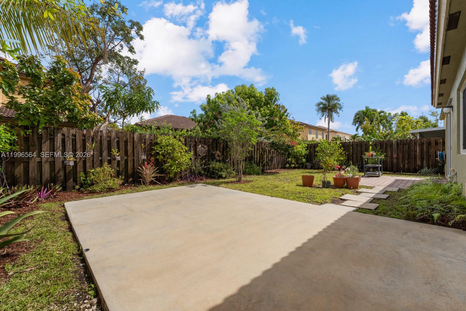 9473 Southwest 227th Terrace Cutler Bay, FL 33190 - Photo 23 of 31 a view of backyard with green space