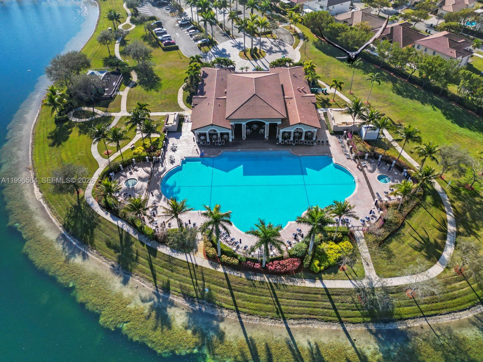 9473 Southwest 227th Terrace Cutler Bay, FL 33190 - Photo 27 of 31 a view of a swimming pool with sitting area