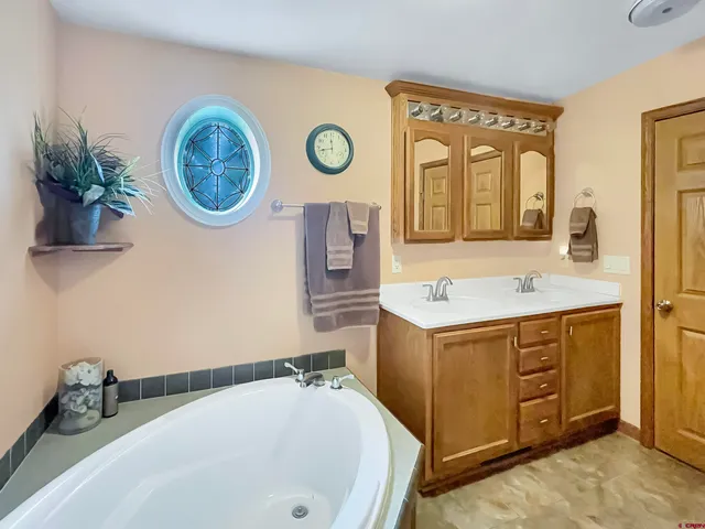 a bed room with a bed and a window