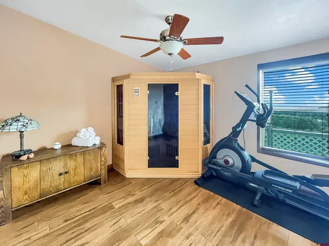 a work room with furniture and a window