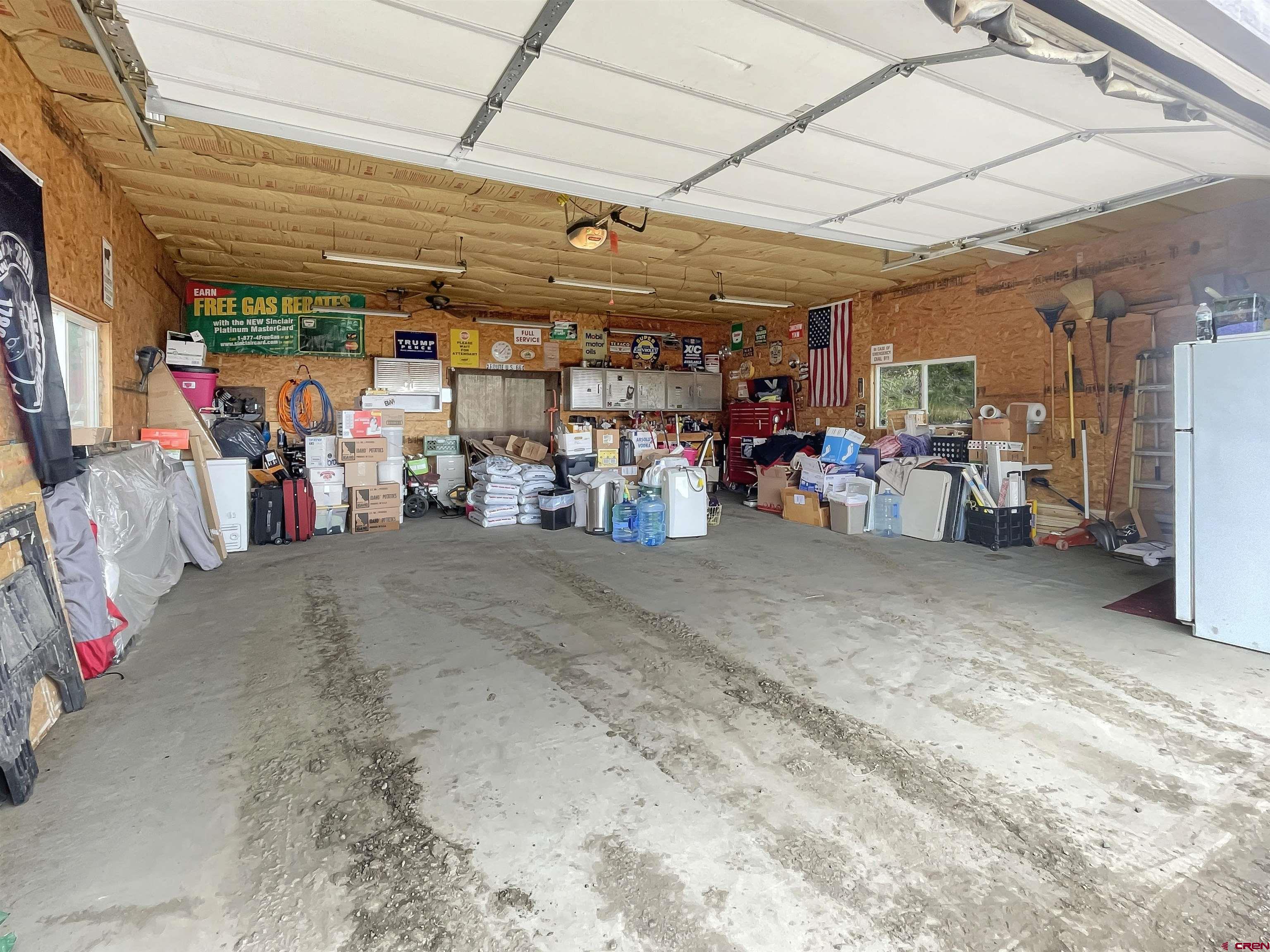 43396 Long Gulch Road Crawford, CO 81415 - Photo 32 of 35 a view of a storage room with a lot of stuff