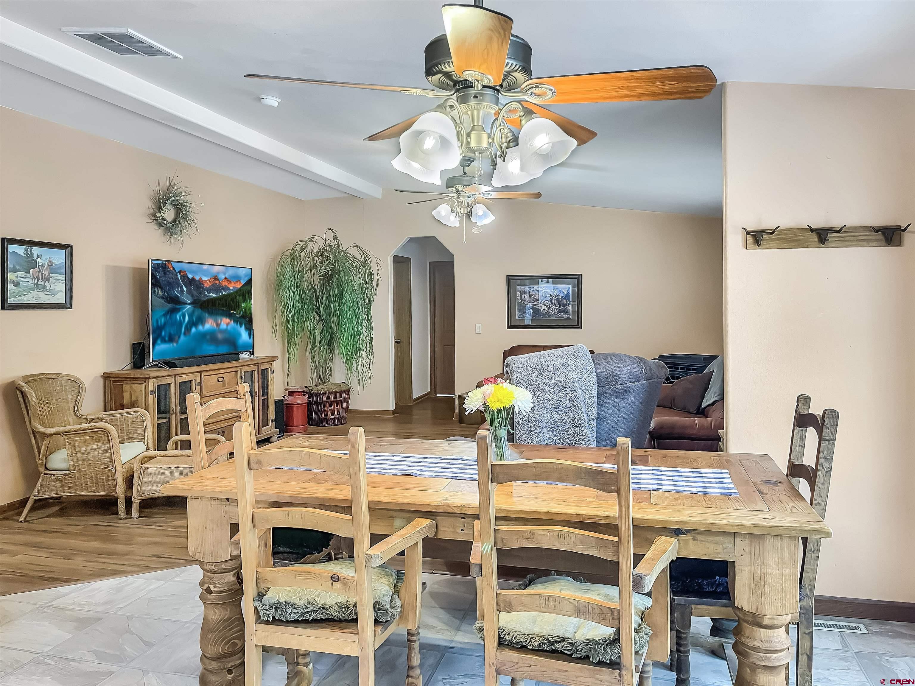 43396 Long Gulch Road Crawford, CO 81415 - Photo 9 of 35 a view of a dining room with furniture