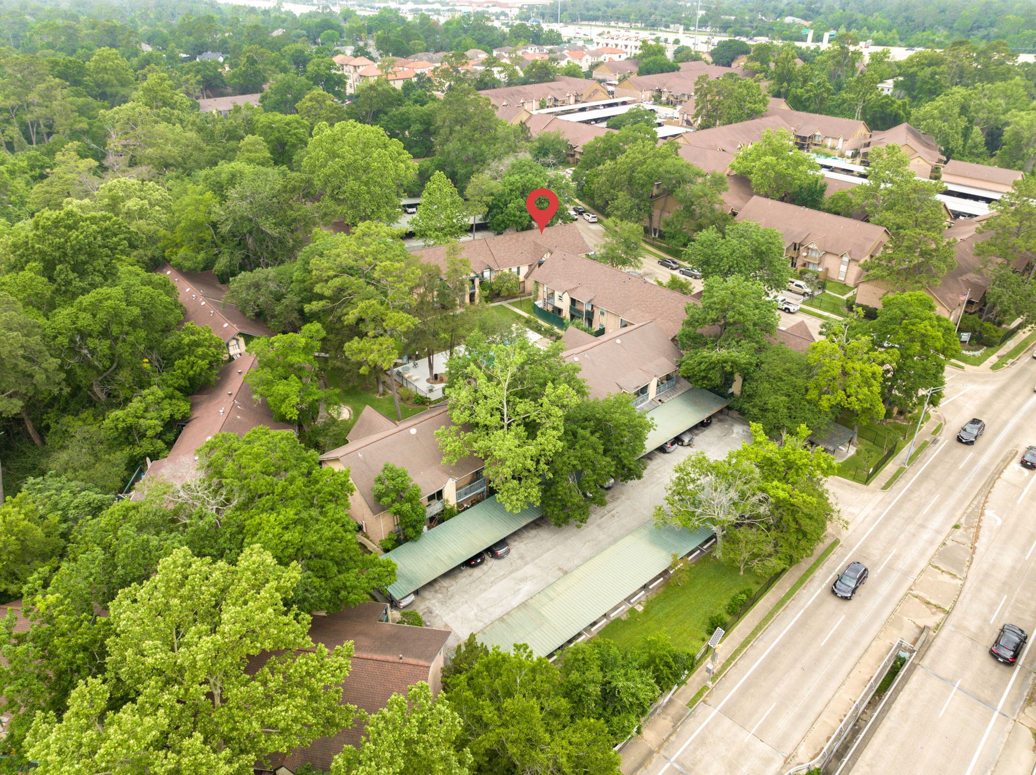 8229 Kingsbrook Road, Unit 229 Houston, TX 77024 - Photo 41 of 50 an aerial view of residential houses with outdoor space
