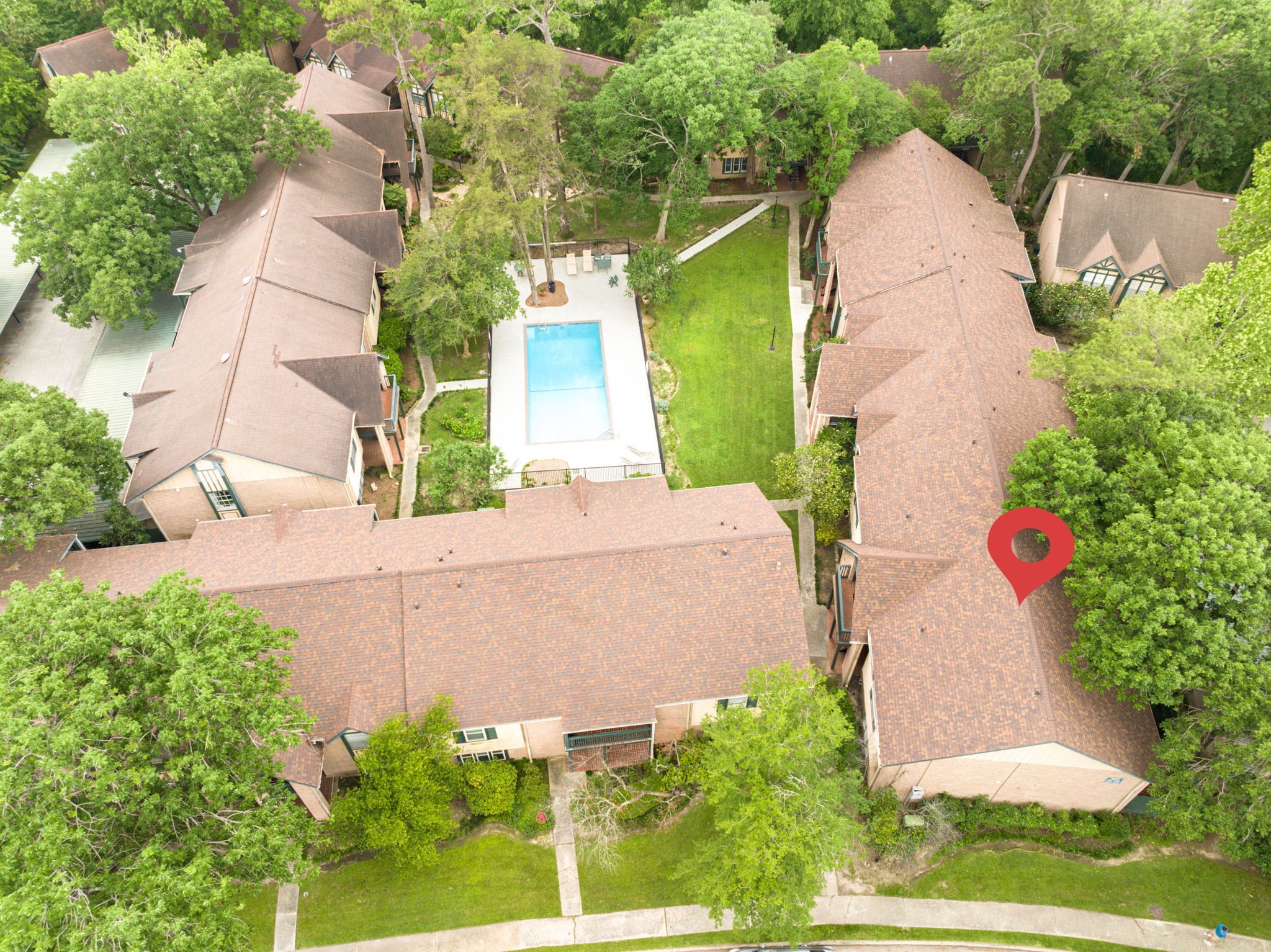 8229 Kingsbrook Road, Unit 229 Houston, TX 77024 - Photo 45 of 50 an aerial view of a house with yard and swimming pool